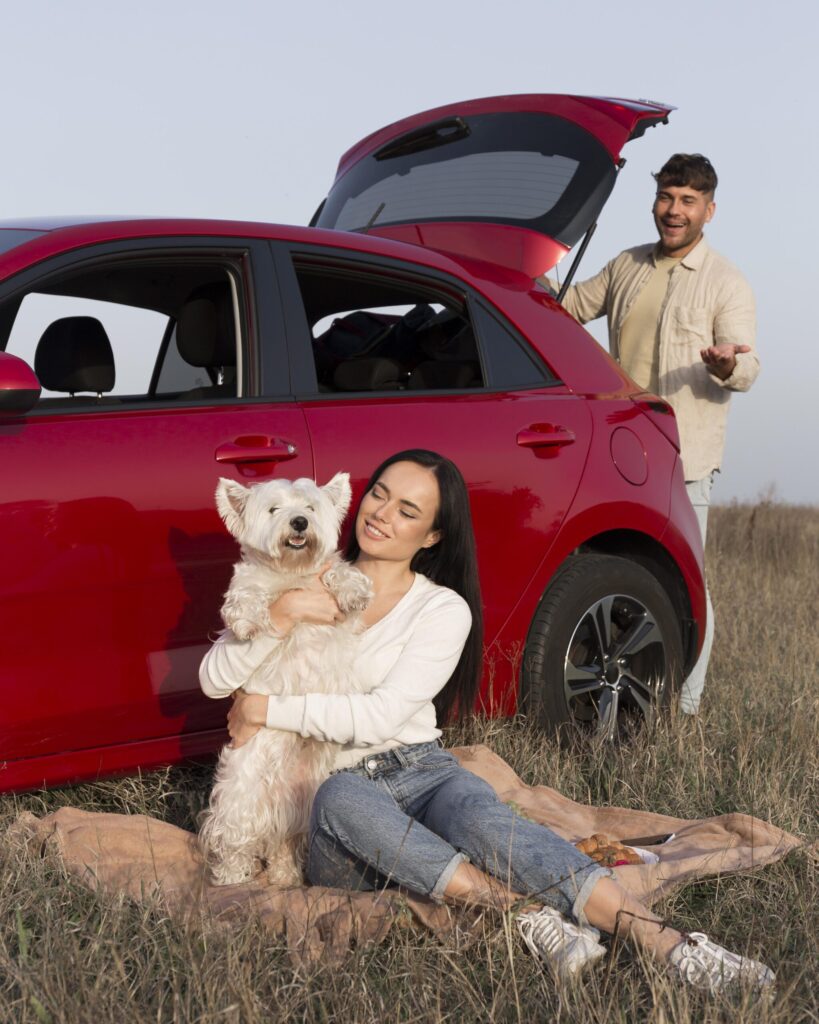 full shot happy couple with dog scaled.jpg